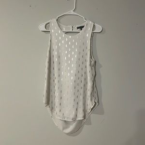 White tanktop with metallic silver detail and open back